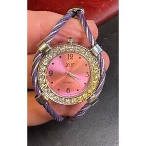 Women's 35mm Solver Tone Daisy Fuentes Watch, Twisted Cable Bangle Band